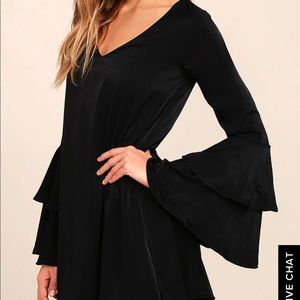 Black mini dress with bell sleeves